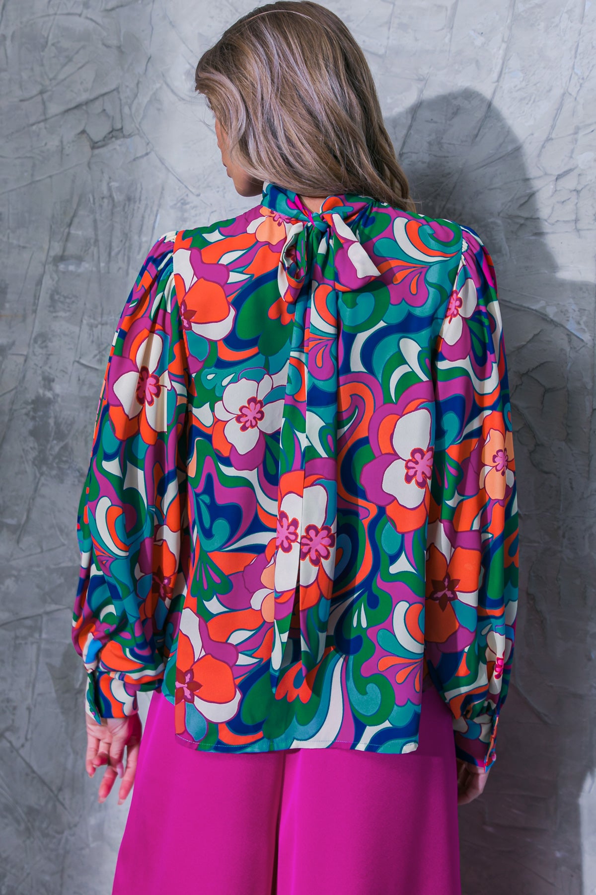 Elegant statement blouse in bold fuchsia navy mix.