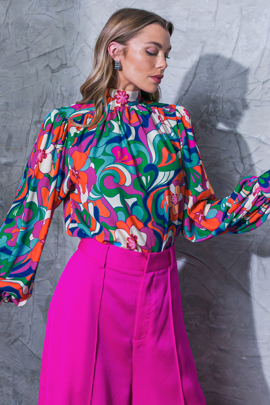 Elegant statement blouse in bold fuchsia navy mix.